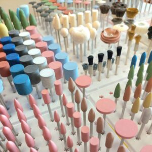 Goldsmith polishing instruments and brushes for handheld motors